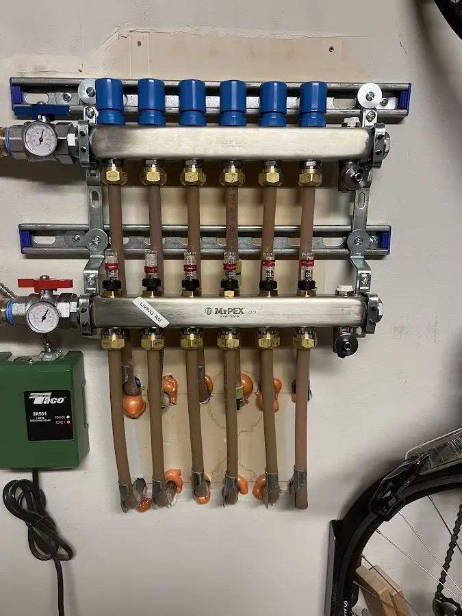 Plumber performing Sink Repair at a residential property in North Wales